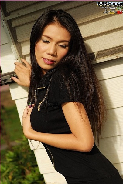 Un dressed in black, Loretta enjoys her naked freedom 01