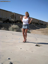 Kelly shows off her super hot tits in the middle of the desert 03