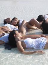 Six models sunbathe naked at the beach 03