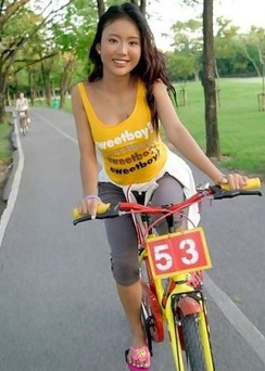 Vivian Lin bicycles home to play with her toys